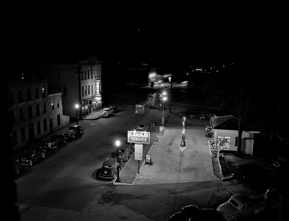 The Wee Small Hours: Gas station at night in Dubuque, Iowa, April 1941.