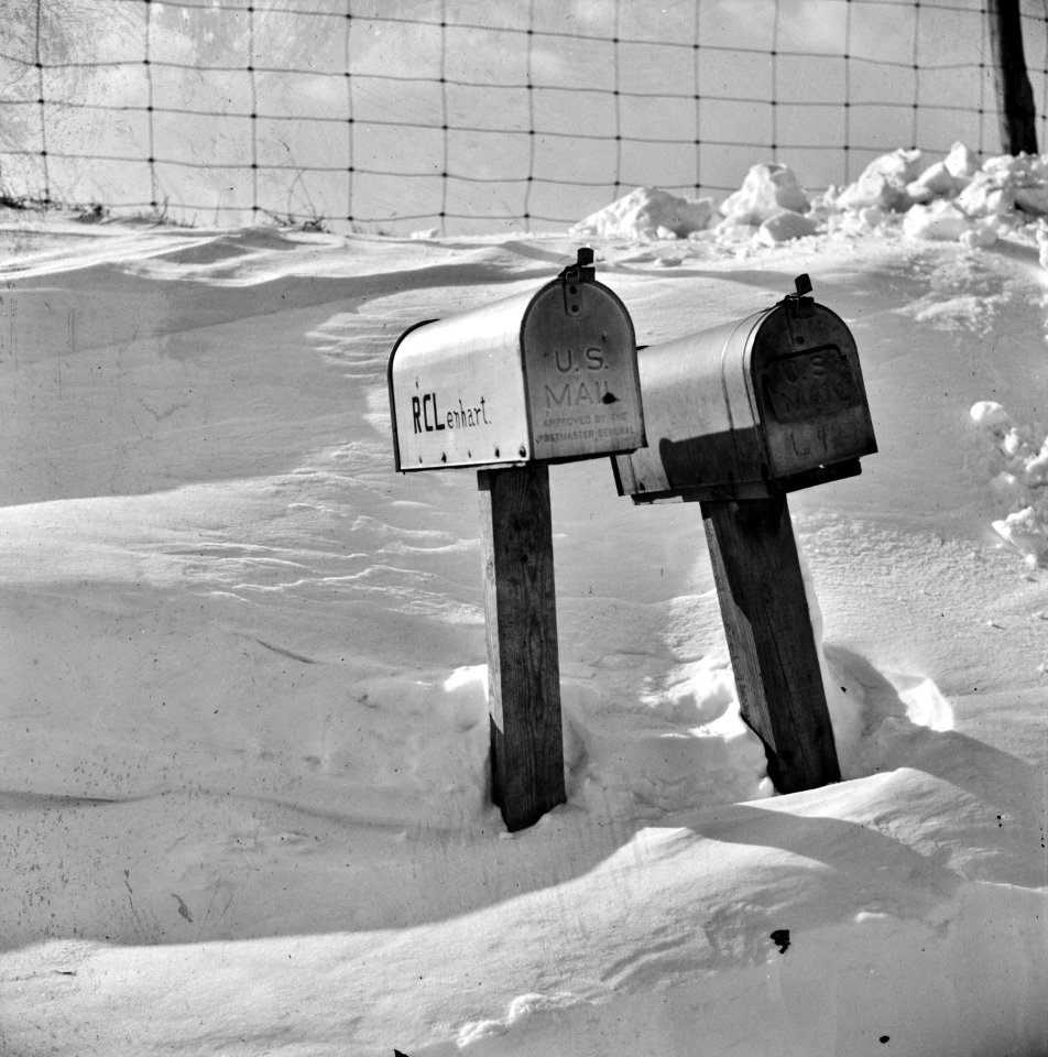 Through Sleet & Snow: Mailboxes for farms on the highway near Frederick, Maryland, January 1940.