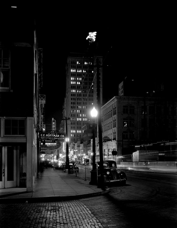 Corner Sentinel: Night view, downtown section. Dallas, Texas, 1942.