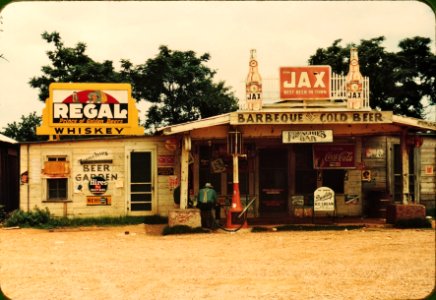 Best Beer in Town: A cross roads store, bar, juke joint, and gas station in the cotton plantation area, Melrose, Louisiana, June 1940. photo