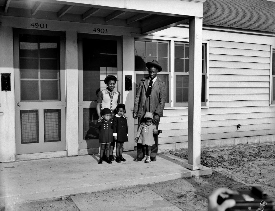 Fashionable Set: An African-American family recently moved into the Sojourner Truth homes for War workers. Detroit, Michigan 1942.