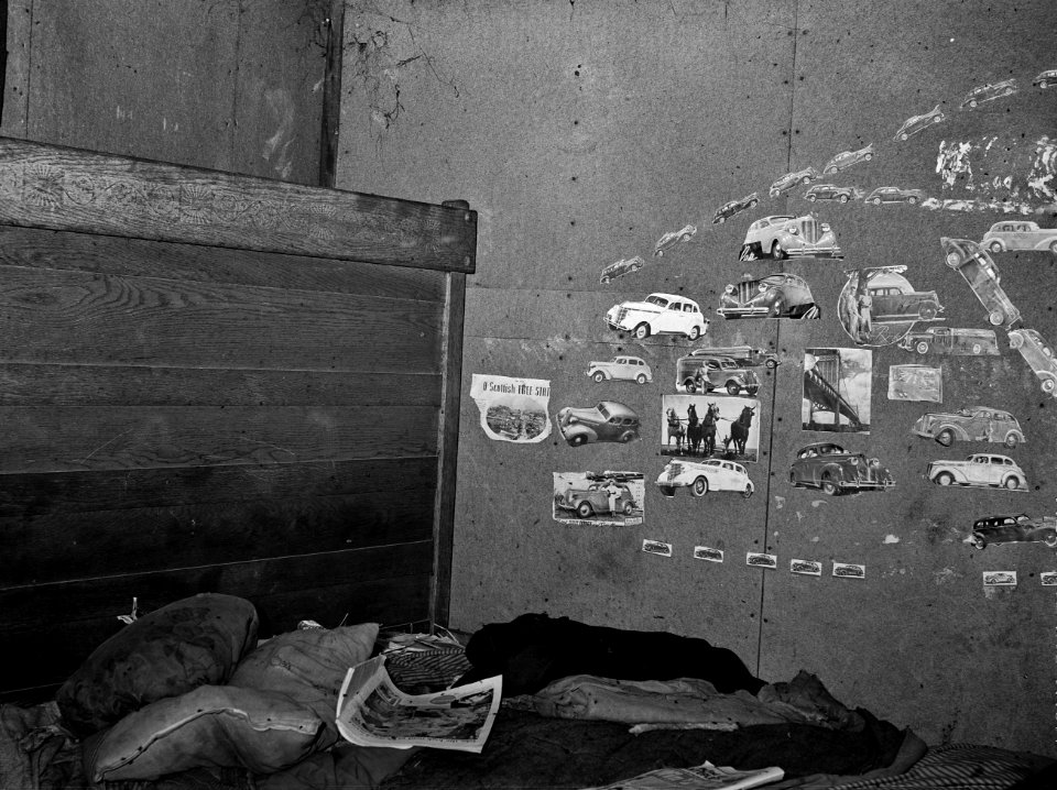 Wall of Dreams: Room in which migratory agricultural workers sleep. Camden County, New Jersey October 1938.