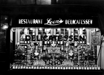 Prohibition Repealed: Window display of whiskey at Leon's Delicatessen. Early 1930s.