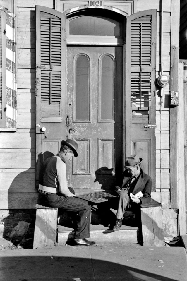 Siesta: Sunday afternoon in New Orleans, Louisiana. Men playing checkers. January 1941.
