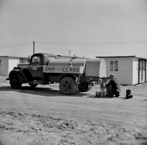 Jimmy The Iceman Cometh: All heating and cooking is done with coal oil in the FSA (Farm Security Administration) housing project. Hartford, Connecticut. September 1941. photo