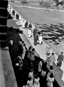 Pomp & Circumstance: Outdoor graduation exercises for 123 high school students in Keysville, Virginia. June 1943.