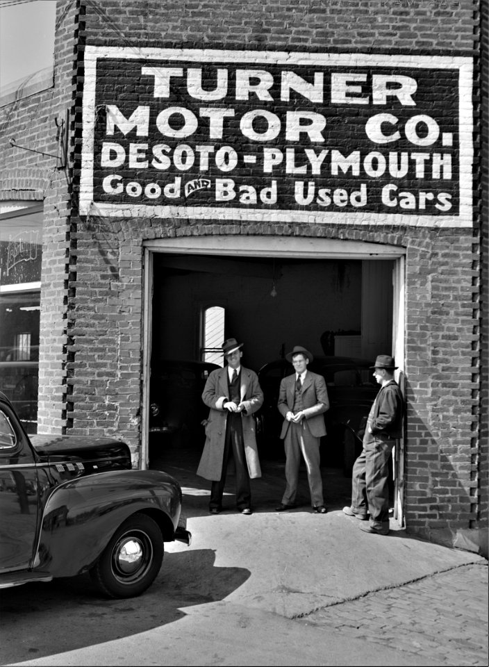 Good and Bad: A used cars retailer in Bedford, Virginia. March 1941.
