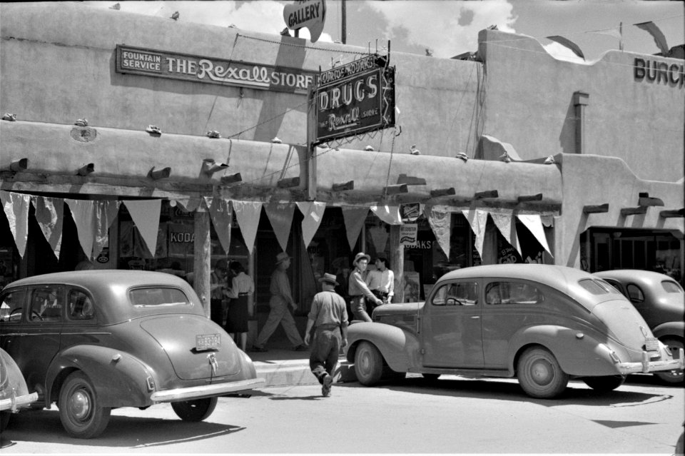 The Place to Be: Parade on fiesta day in Taos, New Mexico, July 1940.