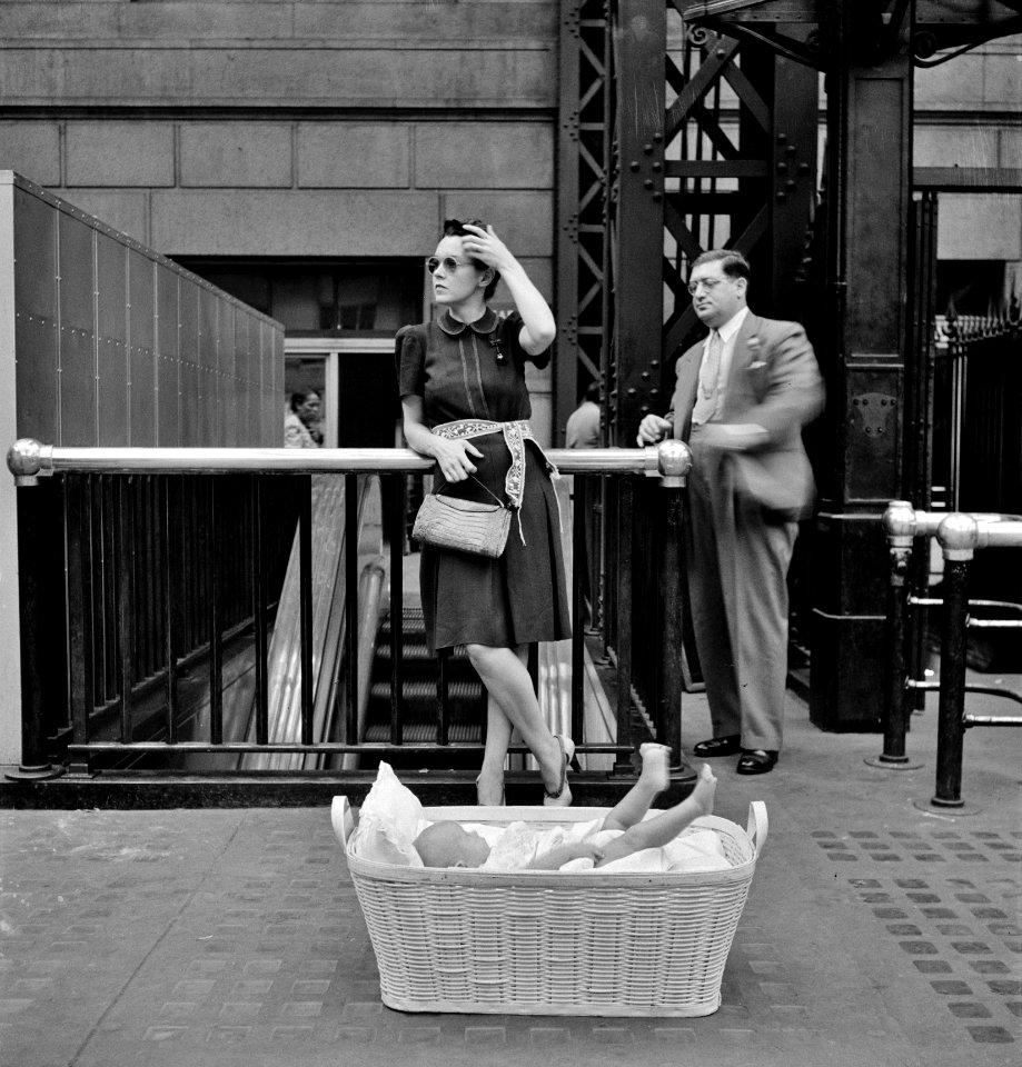 Waiting for trains at the Pennsylvania railroad station, New York City, August 1942.