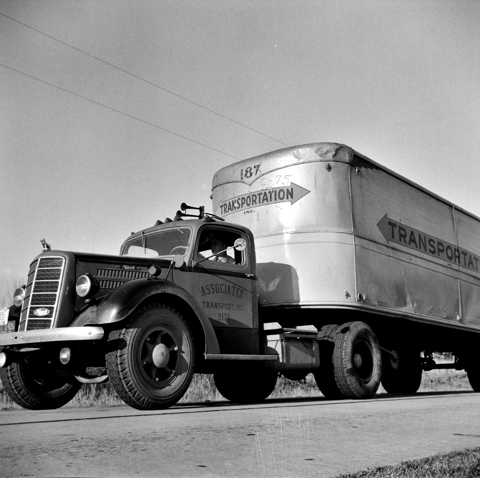 Truck driver Jim Bishop enroute from Atlanta to Montgomery, Alabama on U.S. Highway 29 in Georgia. March 1943.