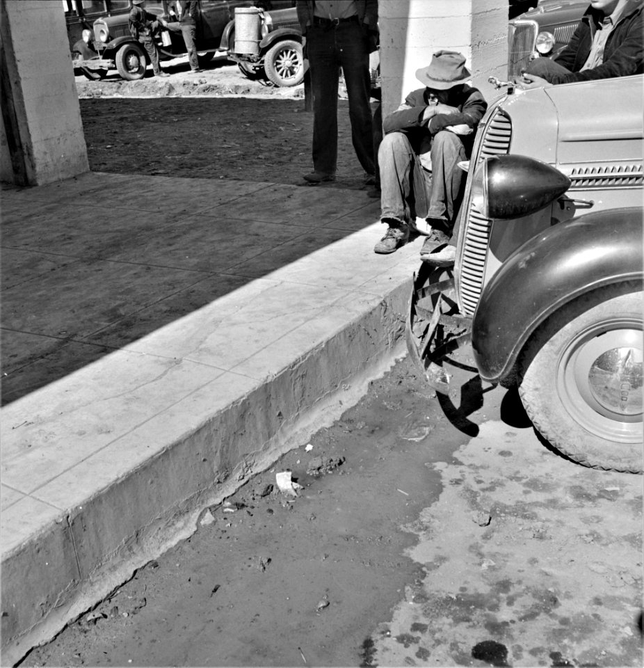 Bleak Harvest: Outside Farm Security Administration (FSA) grant office during the pea harvest. Calipatria, California. February 1939.