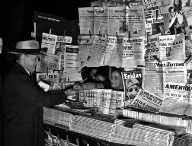 World Headlines: Newsstand with foreign language newspapers, Fall 1941.