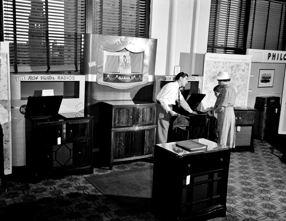 Buying a radio in the Crowley-Milner department store. Detroit, Michigan, July 1941.