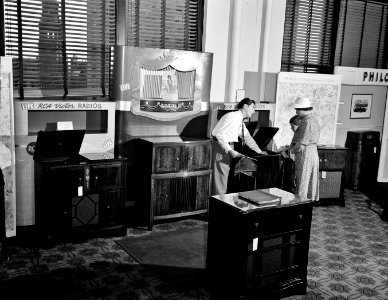 Buying a radio in the Crowley-Milner department store. Detroit, Michigan, July 1941.