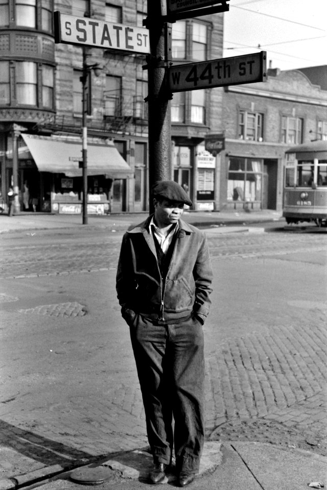 Corner Pockets: Portrait of a man on the corner of 44th and State Streets, Chicago, Illinois, 1941.