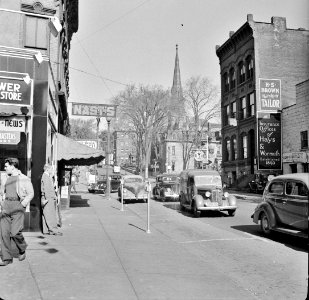 Fall Sun: Amsterdam, New York. Street scene, October 1941.