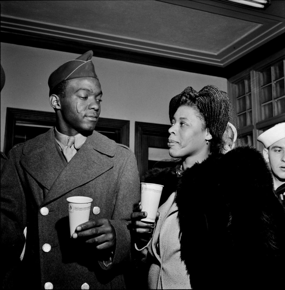 Eye for an Eye: Washington, D.C. Part of the line waiting to board one of the special buses for servicemen leaving the Greyhound terminal on Sunday nights. April 1943.