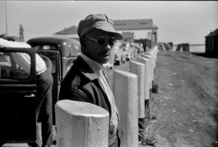 Roadside Style: Migratory agricultural worker waiting at the Little Creek end for the Norfolk-Cape Charles ferry. July 1940. photo