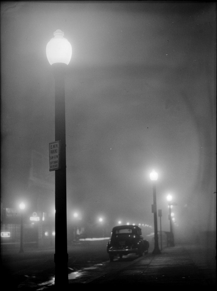 On Little Cat Feet: Foggy Night street scene in New Bedford, Massachusetts, 1940.