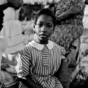 A young girl, daughter of a farmer, watching and waiting. Ridge well project. Saint Mary's County, Maryland, June 1941. photo