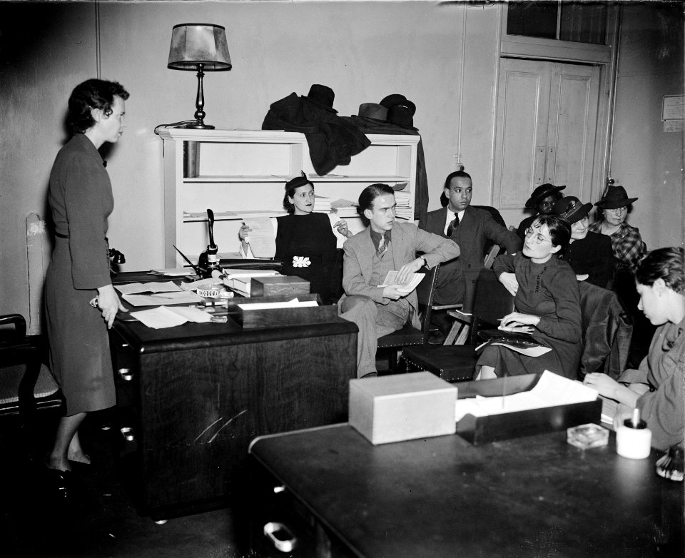 Any Questions: Miss Eleanor Nelson, Secretary and Treasurer of the United Federal Workers of America, teaches the class in union organization at the federal workers school. 1937.