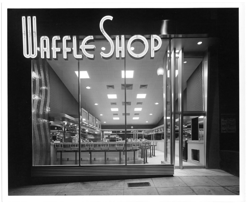 Waffle Noir: Shop on 10th Street. Exterior of Waffle Shop with neon sign. Circa 1940s.