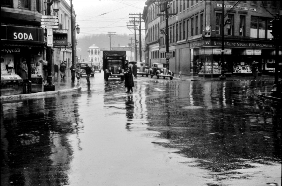 Five & Dime: Main street intersection in Norwich, Connecticut on a rainy day. November 1940