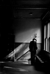 Man in the Shadows: Interior of railroad station in Hagerstown, Maryland. October 1937.