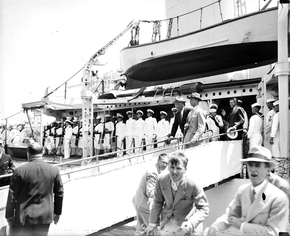 Disembark: President Roosevelt leaving U.S.S. Target at Jacksonville at conclusion of a fishing trip in March, 1935.