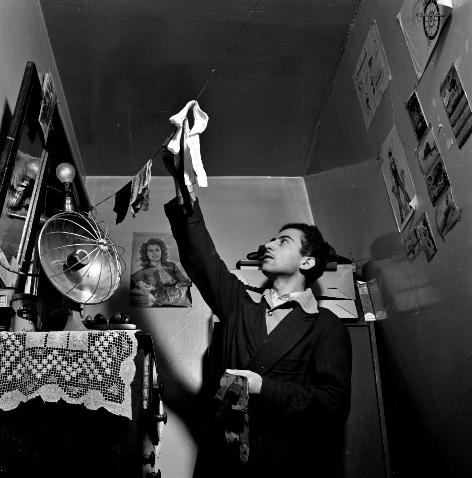 Elbow Room: This boardinghouse room needs a heater in the winter and a fan in the summer. Washington, D.C. January 1943.