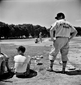 Players in an amateur baseball game between the employees' recreation association and a team recruited from garage workers. Washington, D.C. June 1942.