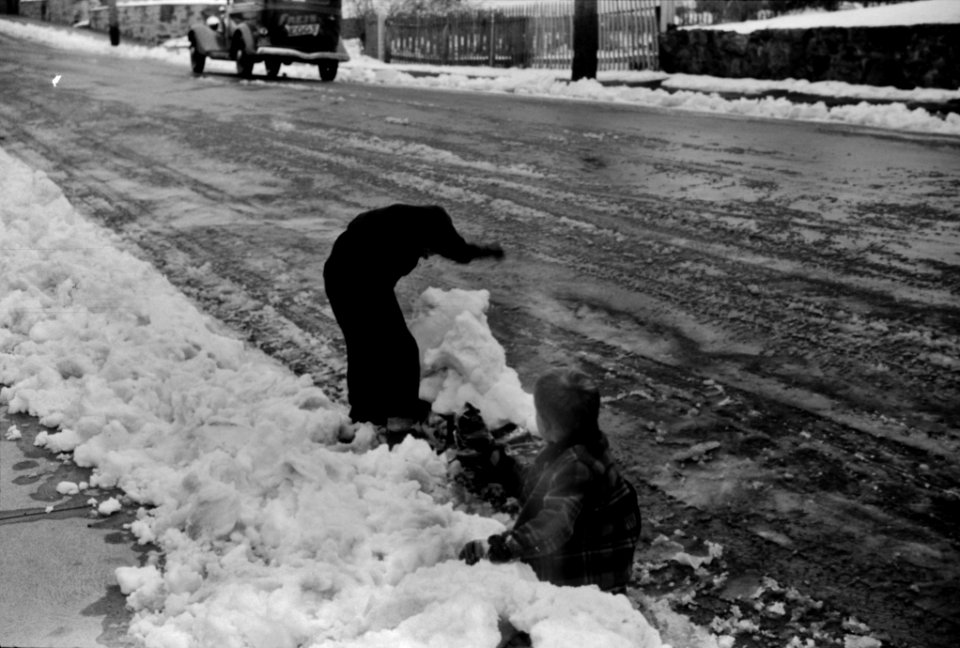 Playing in Traffic: Two Children playing in snow in Norwich, Connecticut, November/December 1940.