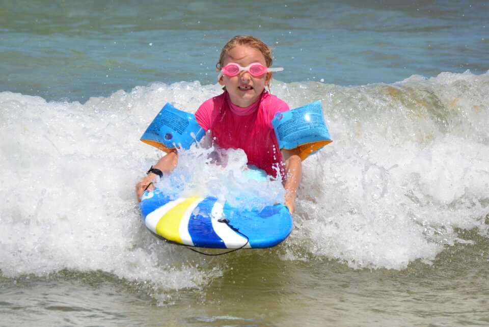 Waves surfboard people