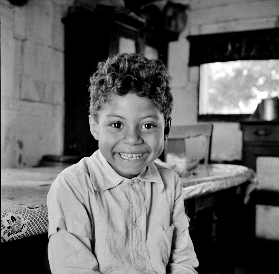 John Fredrick's son says "We sure hate pullin' water." The New Deal well project will help imrove the quality of life for this family. Saint Mary's County, Maryland July 1941.
