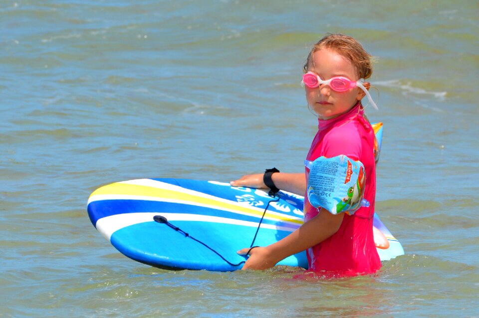Waves surfboard people