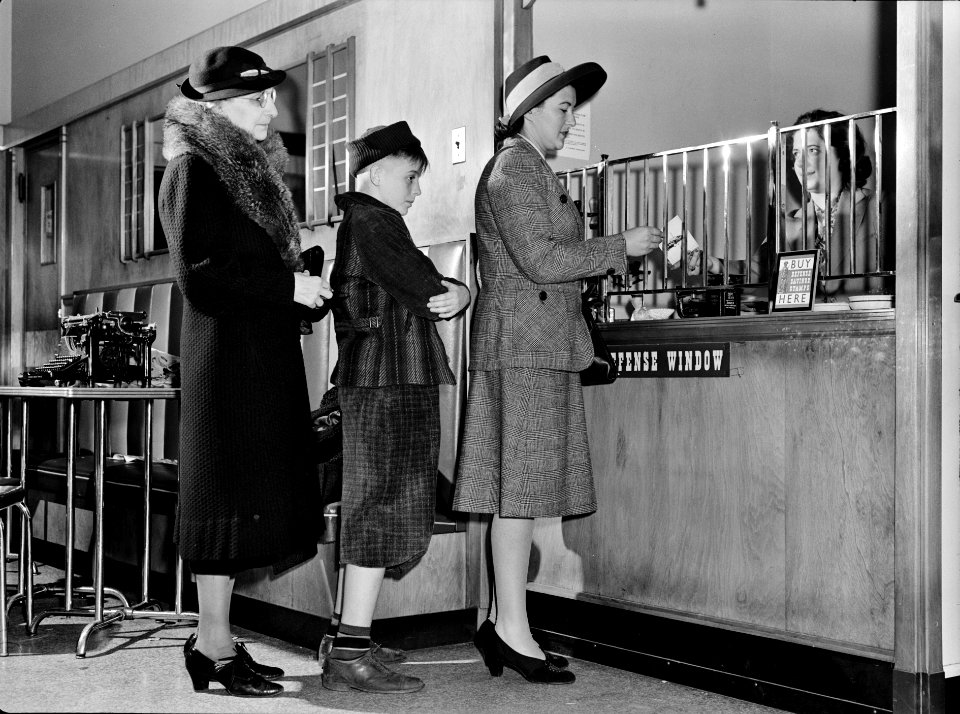 Wartime tips: For insurance against the Axis, buy defense bonds and stamps. You can get them at your bank, post office, department store and from your newsboy. Buy them regularly and frequently. February 1942.