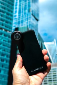 Smartphone on a skyscraper background photo