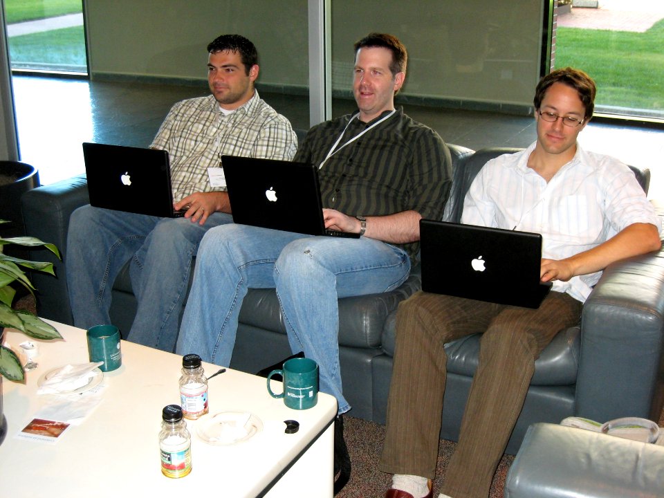 Three Black MacBooks
