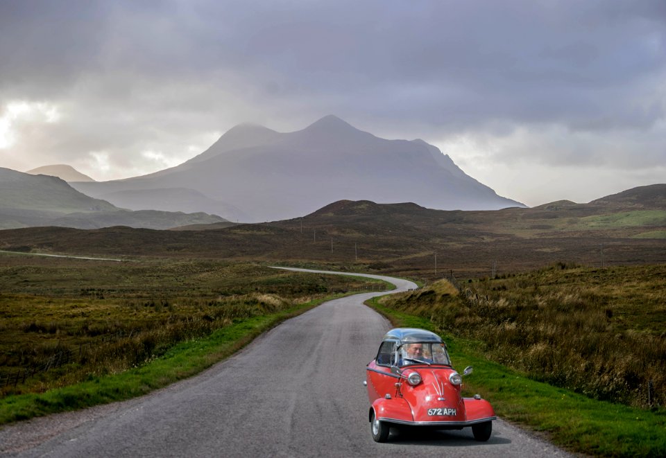 small car in a big landscape