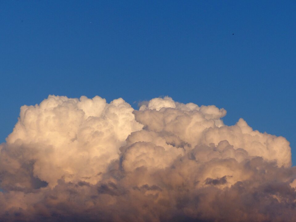 Sunset clouds form covered sky