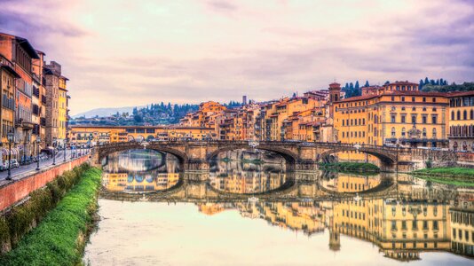 Arno river sunset reflections