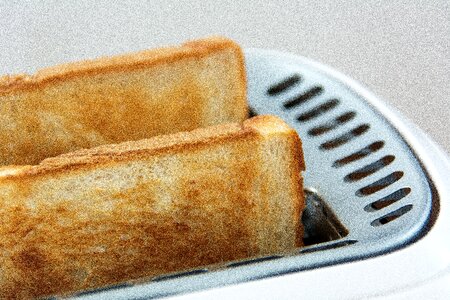 Edible white bread slices of toast photo