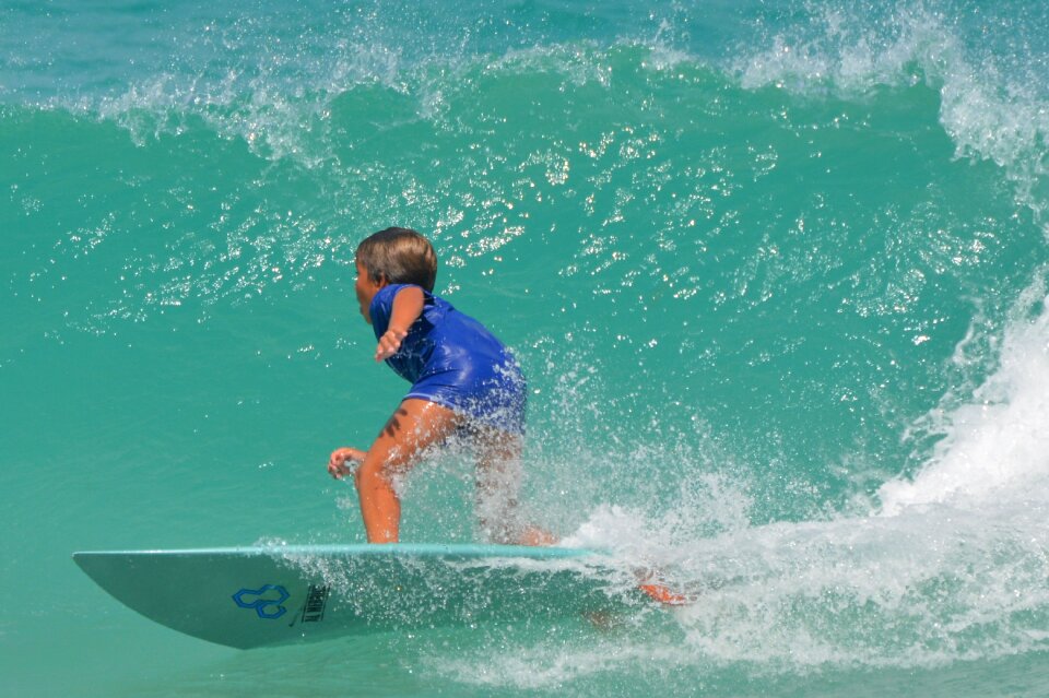 Child surfboard sports photo