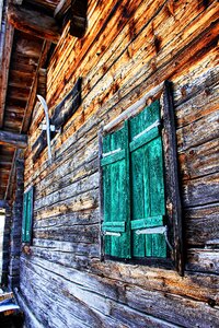 Facade old house wooden windows photo