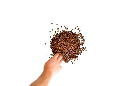 Hand taking roasted