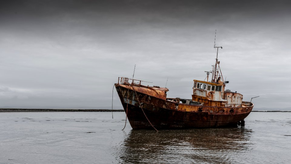 UnLoved Boat -- tired and old photo