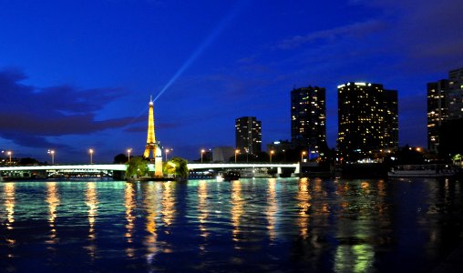 Paris - Eiffel tower, seine river and buildings by night