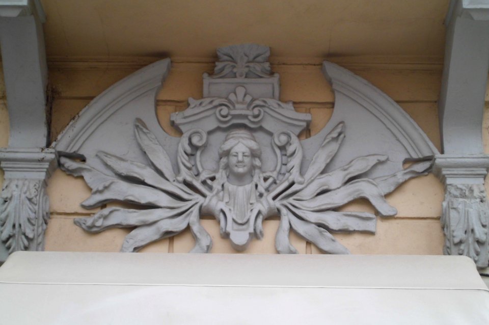 grotesque on door lintel