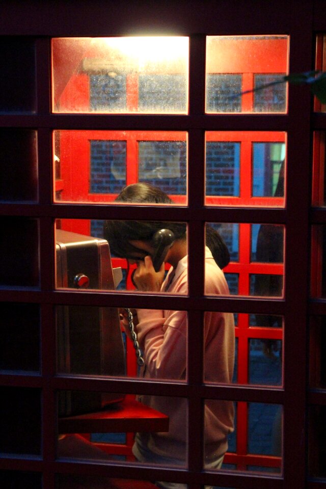 Loneliness a public telephone booth lighting effects