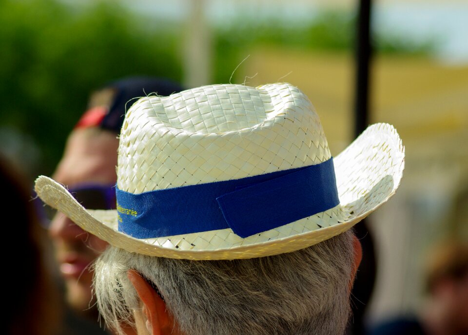 Senior straw hat gray hair